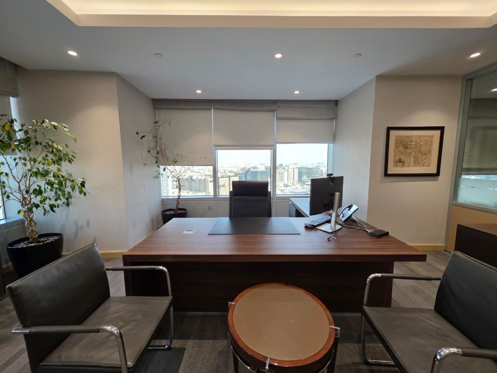 Arcapita Office executive desk with city view